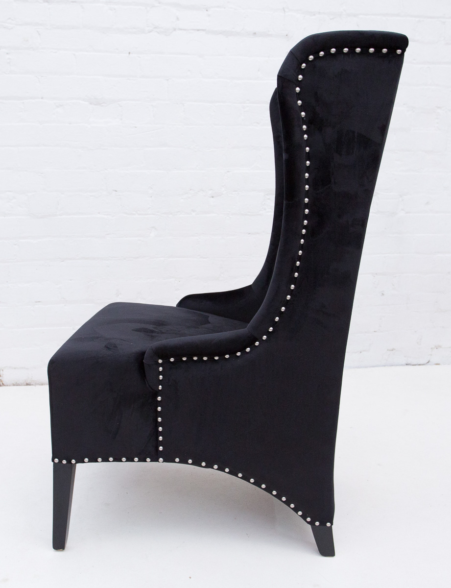 winged large black velvet chair